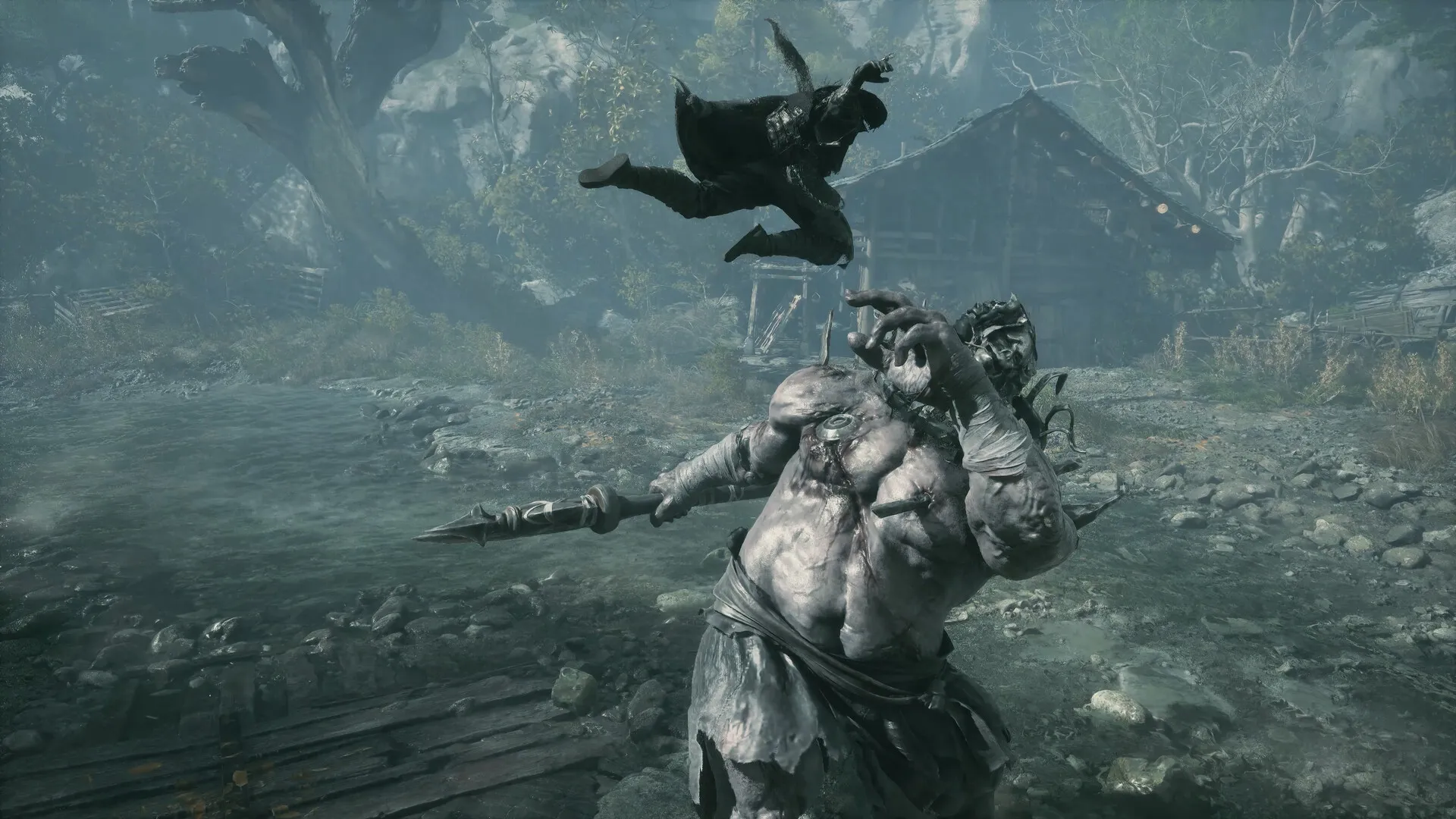 Soul leaps above a club-swinging brute in a rain-soaked stone yard.